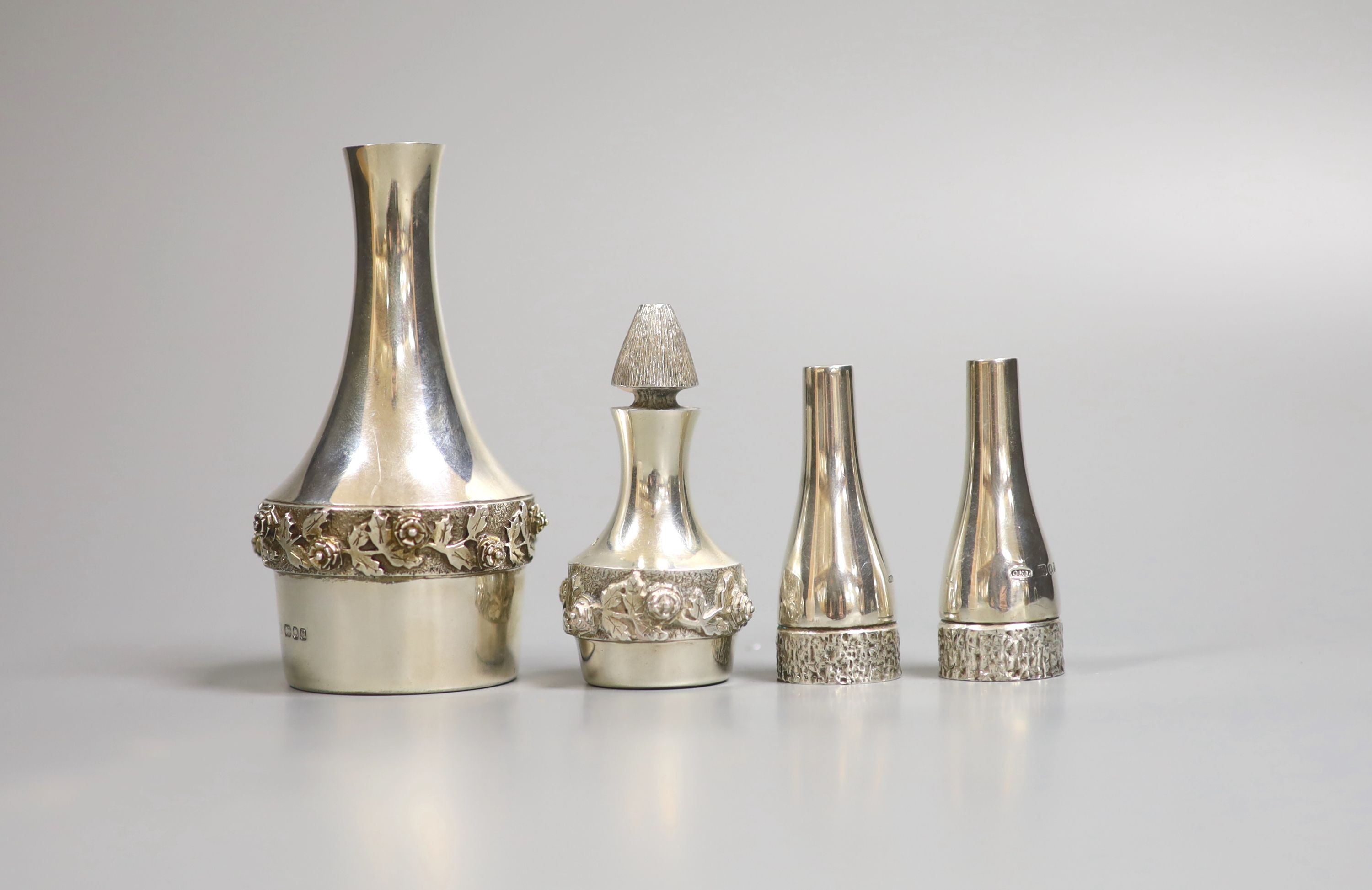 A pair of small modern silver bottle shaped condiments by Christopher Nigel Lawrence, 59mm and two other items by House of Lawrian, the largest, London, 1978.